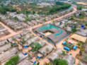 Community Spaces in Rohingya Refugee Response, Cox’s Bazar (Bangladesh) | Aerial view of the Shantikhana Women Friendly Space in Camp 4ext. The construction started before the design was finalised, allowing the local Rohingya workers to express their artisanal skills and artistic freedom. | © Aga Khan Trust for Culture / Asif Salman (photographer)