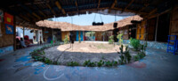 Community Spaces in Rohingya Refugee Response, Cox’s Bazar (Bangladesh) | The open courtyard of the Safe Space for Women and Girls in Camp 25 connects all the surrounding rooms. The shelter provides women of all age with sanitary facilities as well as a place for them to create and share. | © Aga Khan Trust for Culture / Asif Salman (photographer)